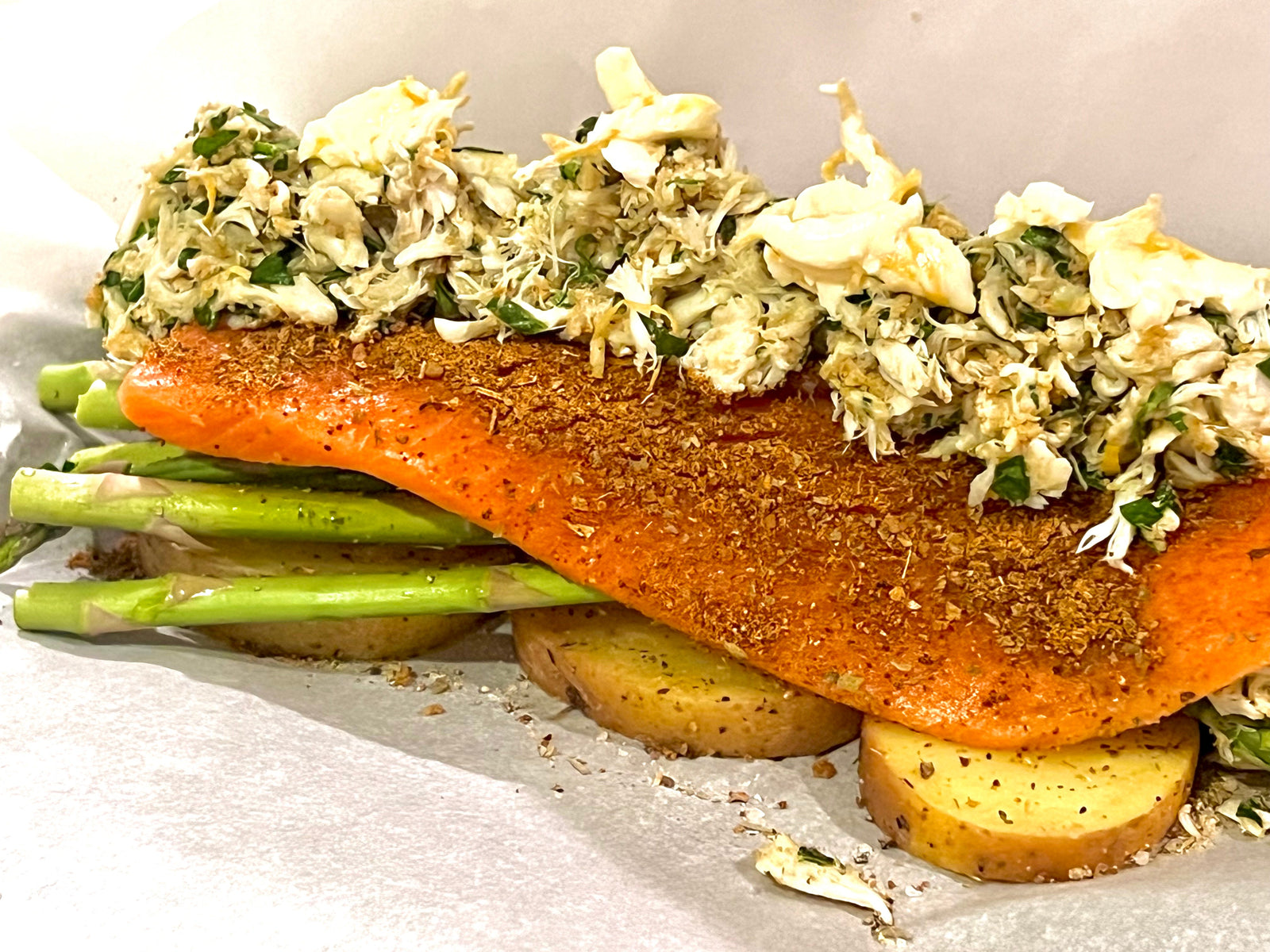 Parchment-Baked Salmon with crab cake–style stuffing delivers elevated flavor with everyday ease.