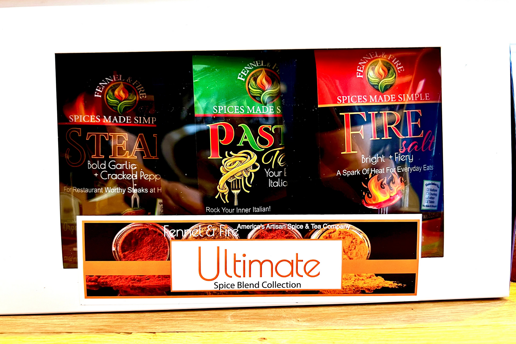 Collection of spice packets including 'Steak', 'Past', and 'Fire' with a visible brand name on a white background.