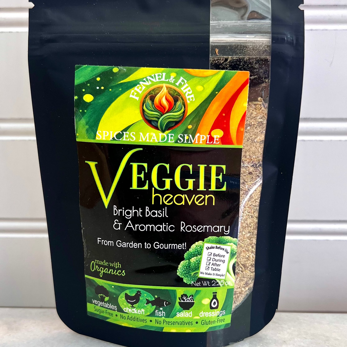 Black spice bag labeled 'Veggie heaven' with a colorful label on a white background